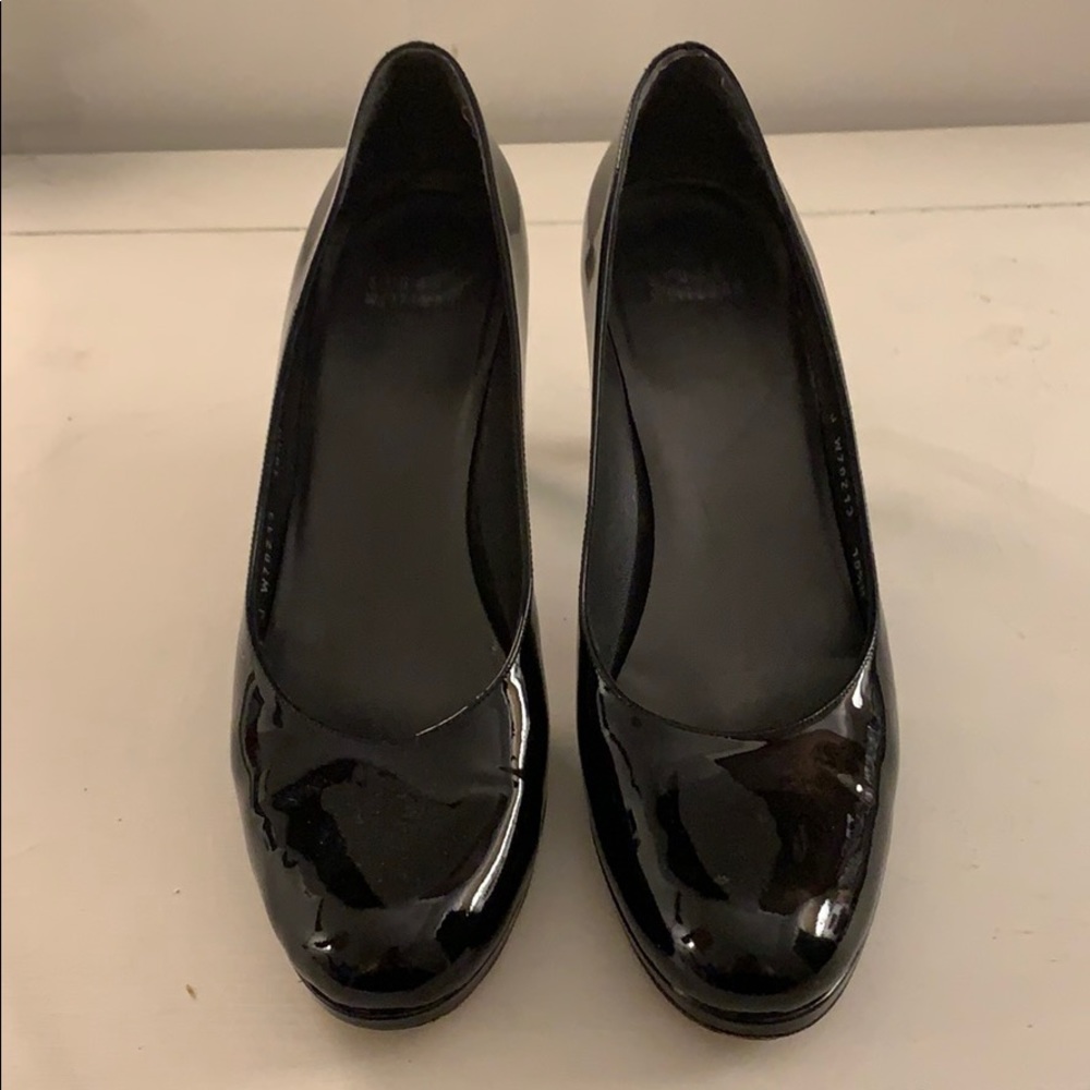 Stuart Weitzman black patent pumps